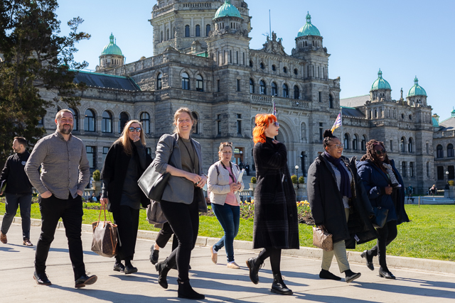 Staff walking in front of B.C. Legislature after press conference