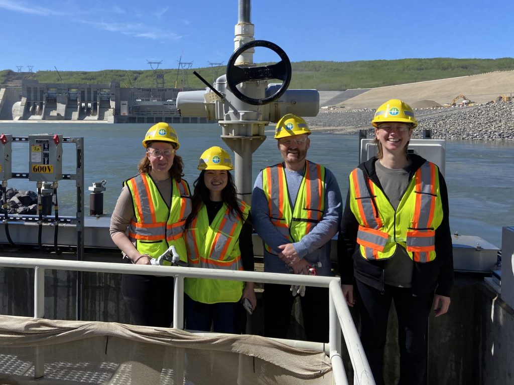 OAGBC staff wearing hard hats at safety vests at the Site C Dam