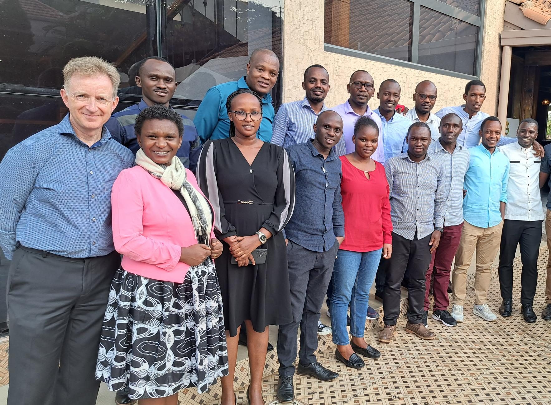 OAGBC staff member standing with group of Rwandan audit staff