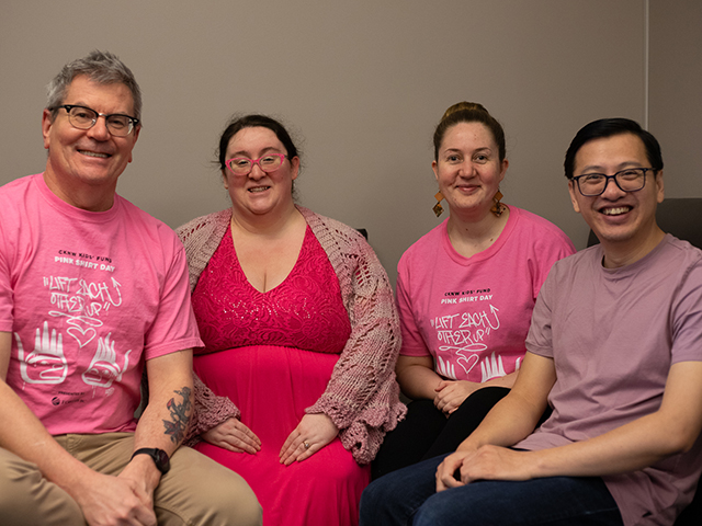 Staff wear pink shirts to raise awareness about bullying