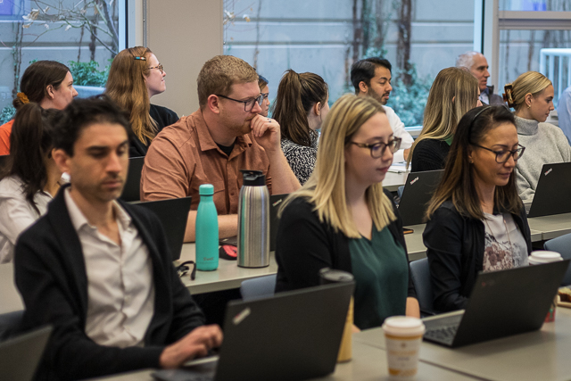 Financial auditors in training session