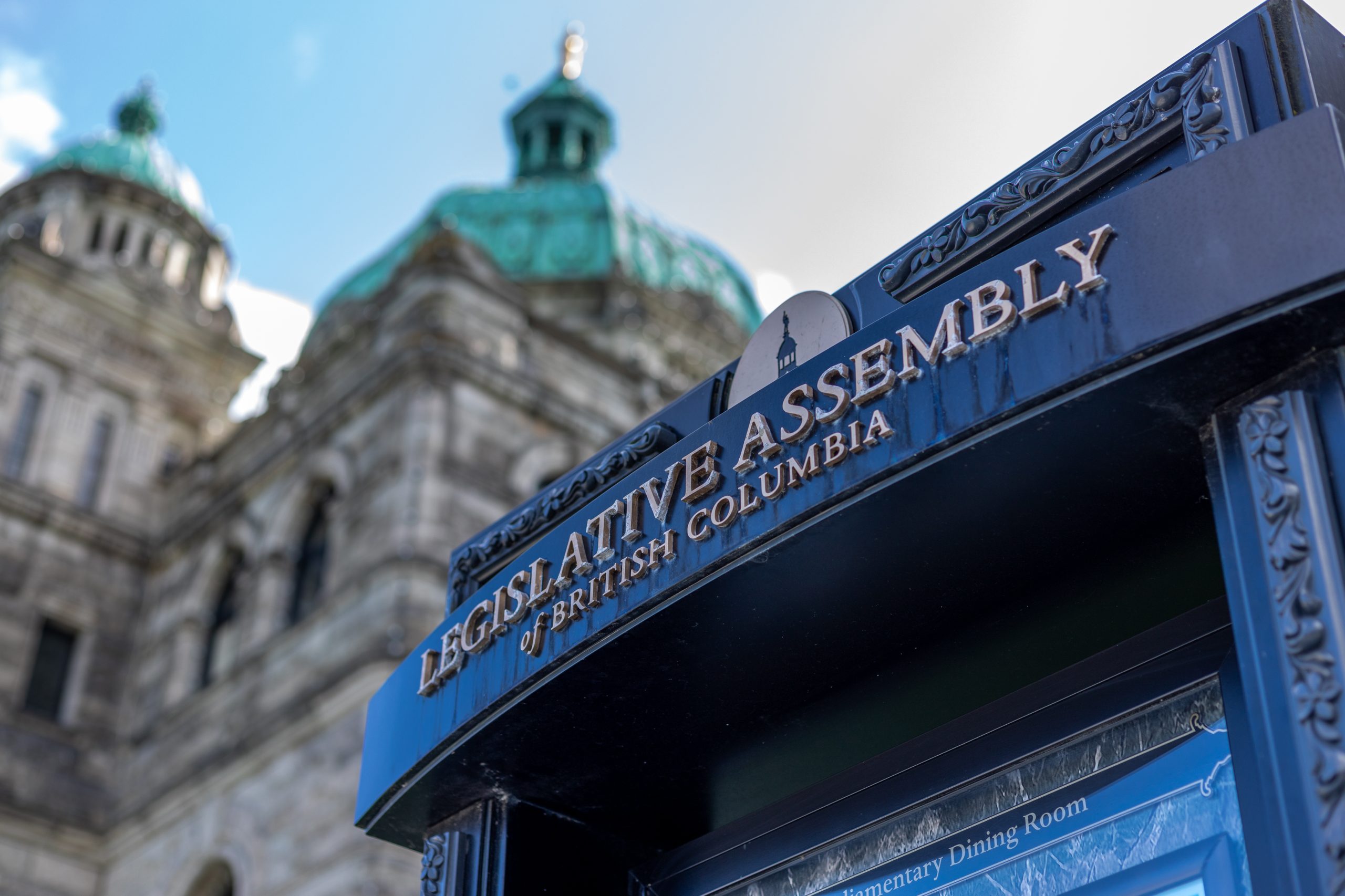 "Legislative Assembly of British Columbia" sign outside of B.C. Parliament Buildings