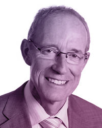 Portrait of an older man, bald, with glasses, in a suit and tie. Name: Russ Jones.