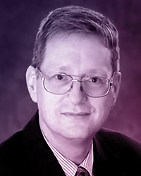 Portrait of an middle aged man, short light brown hair, with glasses, in a suit and tie. Name: Arn Van Irsel.