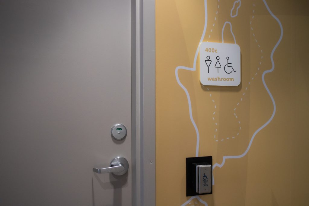 Barrier-free, gender-inclusive washrooms with automatic door openers.